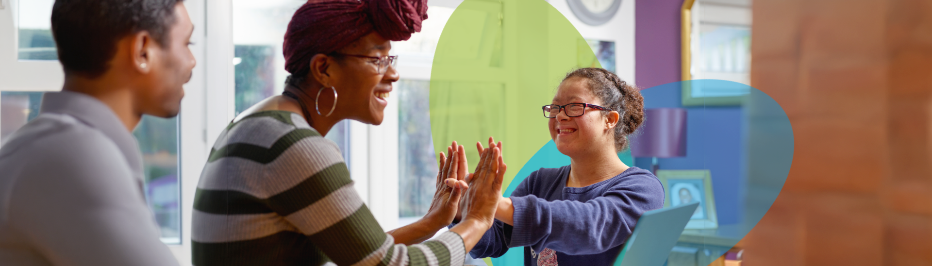 Two Support Workers with an individual with complex care needs