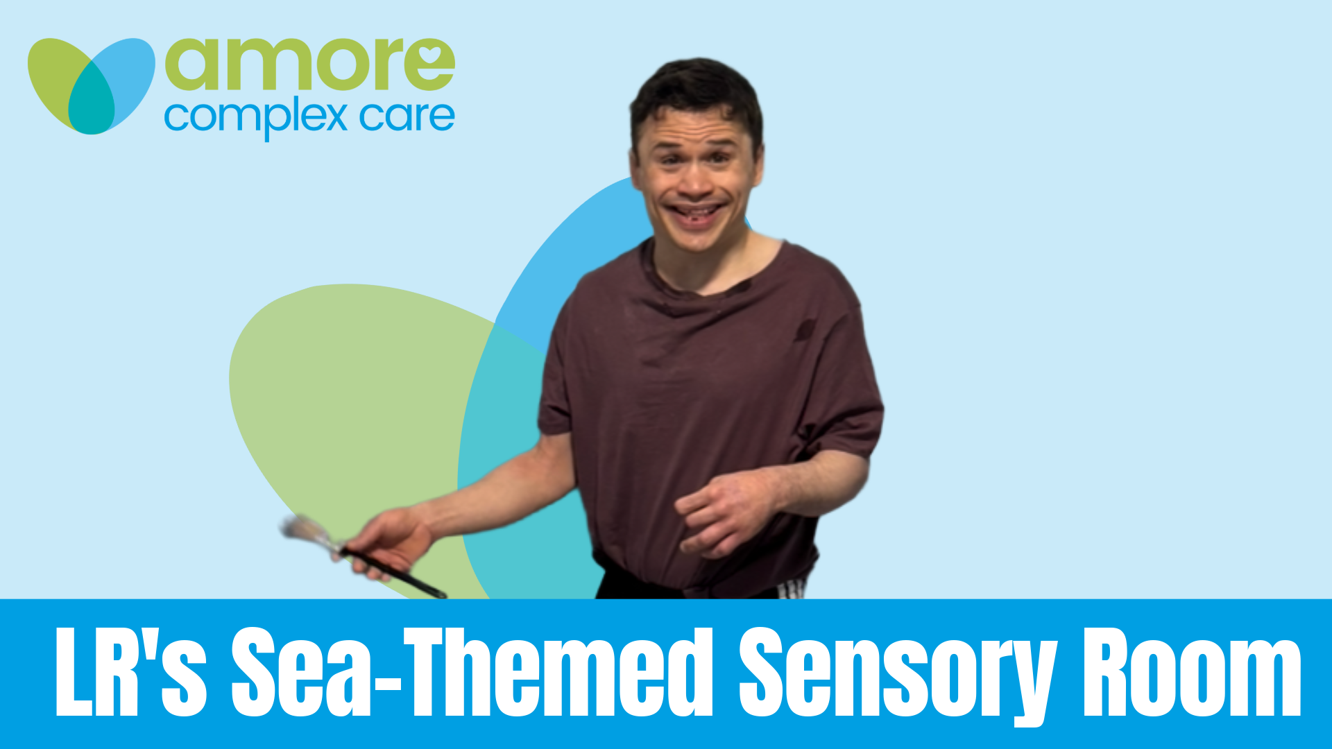 A graphic with a cut-out of LR smiling with a paintbrush in hand, and the Amore Complex Care logo in the back. The text reads "LR's Sea-Themed Sensory Room".